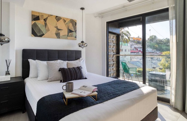 2BR Apt w/ Balcony | Rooftop+FirePit+Gym+Lounge