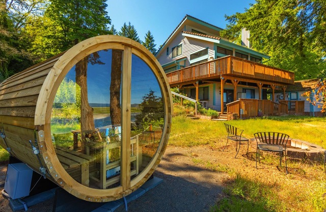2BR waterfront home with beach access and views.