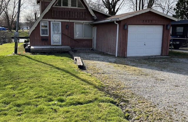 3 bedroom 2 bath renovated A frame on channel to Kuhn lake and the Barbee Chain