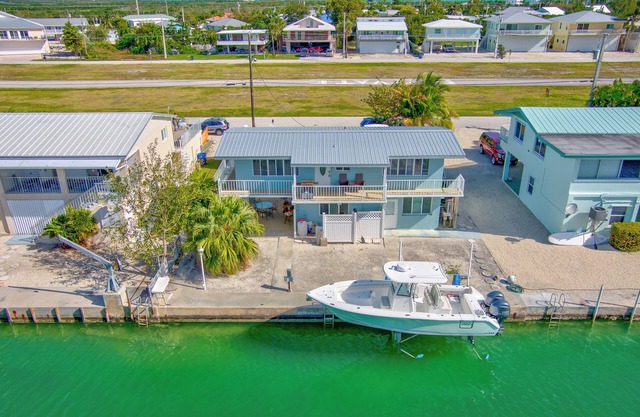 3 bedroom 2 bath home located on Summerland Key airstrip with great boating.