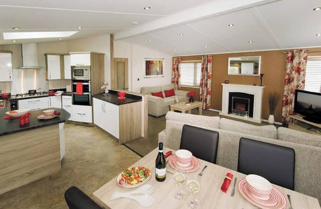 Comfortable and spacious lodge with one double with en suite shower and two twin.