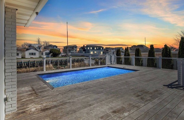 3-bedroom Hampton’s Waterfront home with heated pool and private beach
