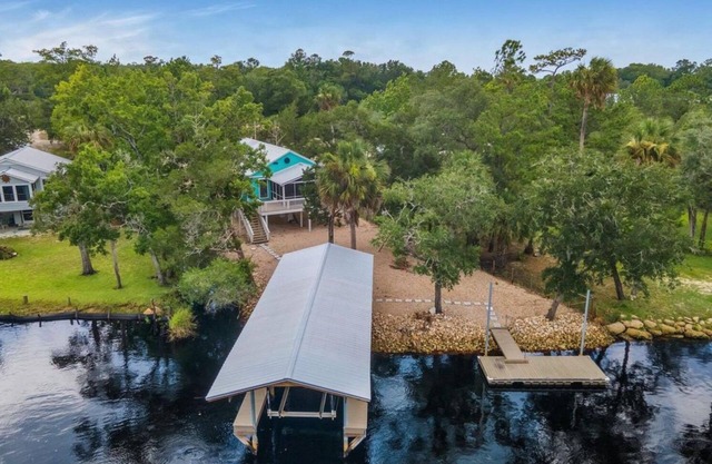 3-bedroom Riverfront home with private boat dock and view of Steinhatchee River.