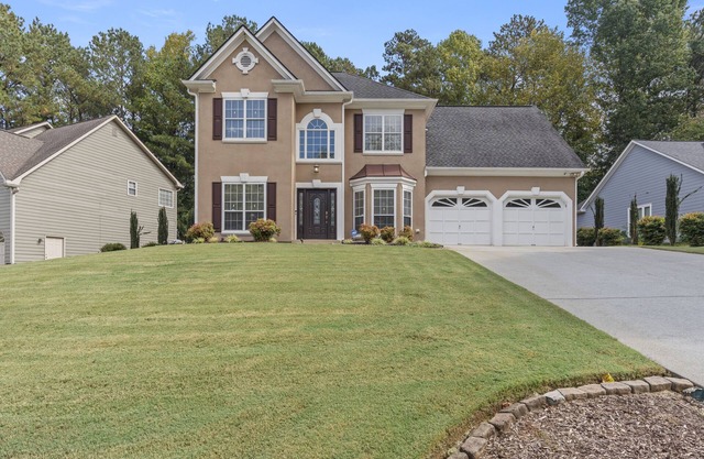 3 Beds 2 &1/2 Bath Family Home! Close to Lake Point, Braves, East Cobb Baseball