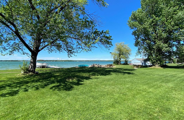 Includes all 3 lakefront Cabins with private beach and yard. Inckudes 4 kayaks