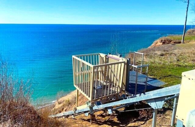 4 Bed, 3.5 Bath home on a High Bluff of Lake Michigan, electric lift to beach