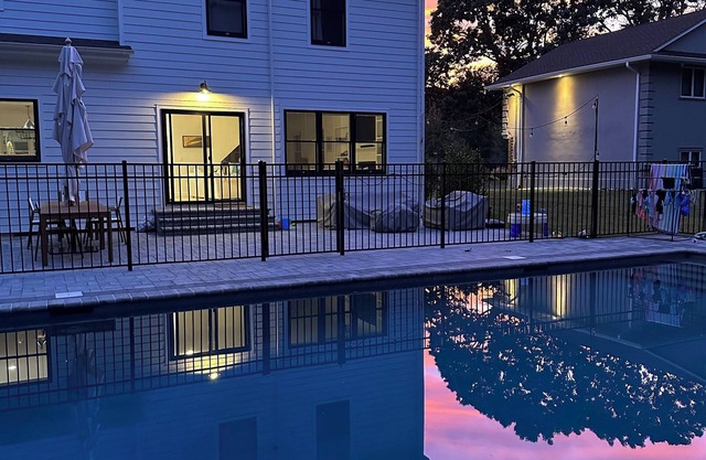 4-bed 3.5-bath house with fenced heated pool and hot tub, fire pit, kids swings