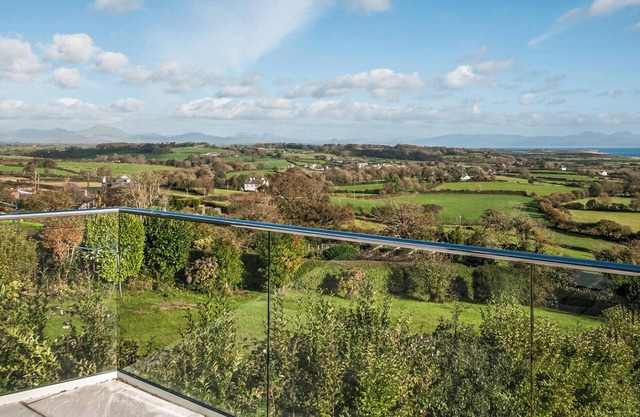 Relax with panoramic views of Cardigan Bay, the mountains of Snowdonia and beaches of the Llyn.