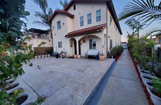 4 Bedrooms 3 Full Bath hops away from Marina & Beach.