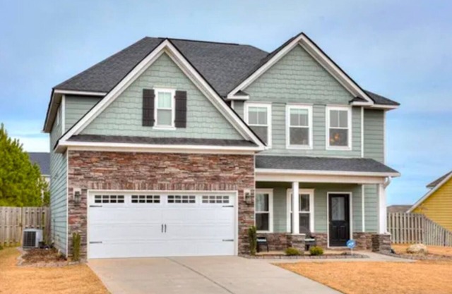 4 bedrooms 3 FULL baths- Large Outdoor Living Space- 20 minutes to the Masters!
