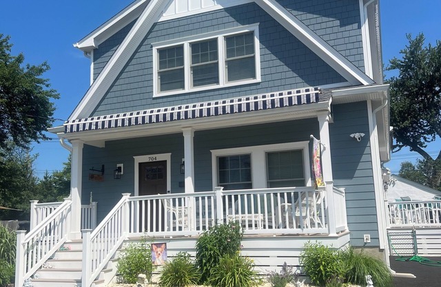 4 BR/2 Bath; freshly painted. New siding, windows, decks and 6 beach badges