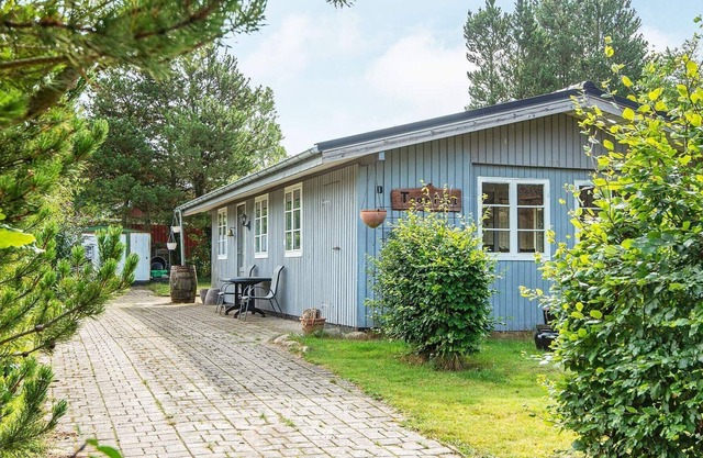 4 person holiday home in Fårvang