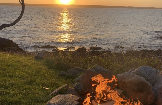 45 feet in the cliffs of maine watching sunsets with a fire! And the whales!!!