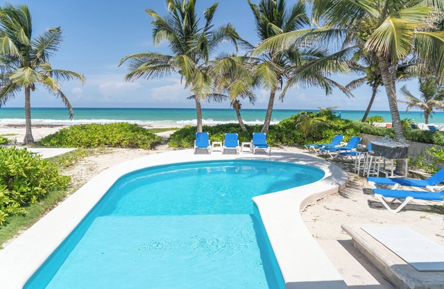 4bdr Beachfront villa in secluded Playa del Secreto, hosts up to 12 guests.