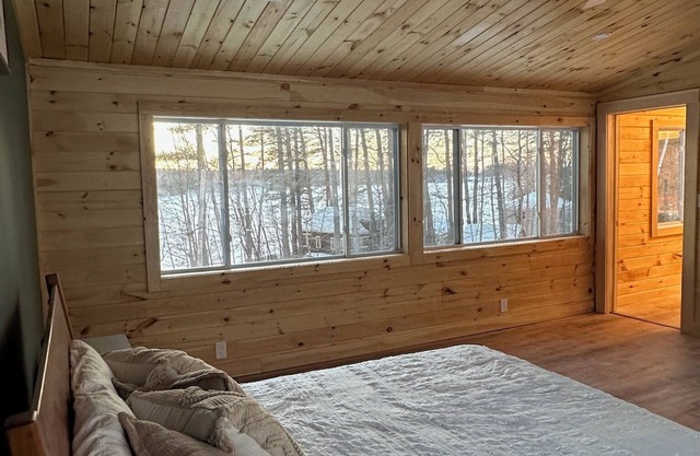 5 bed 4 bath in the Basin of Sebago Lake with 200 ft. of shared beach frontage