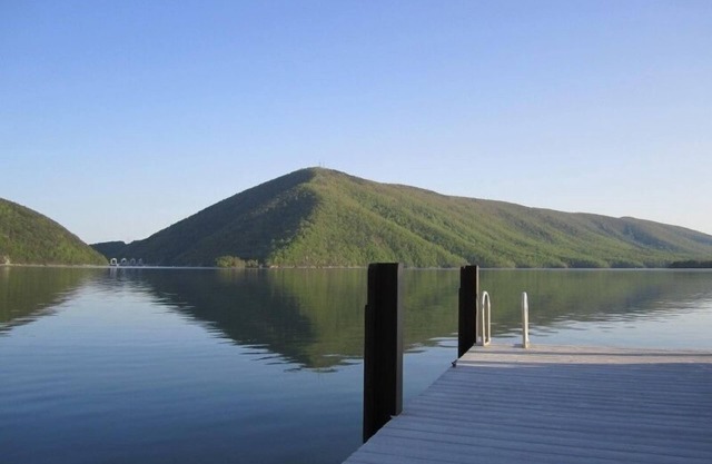 5 Bedrooms, 1 Flex Room, 3 Bathrooms! GORGEOUS Mountain and Wide Water Views! Paved Driveway to th