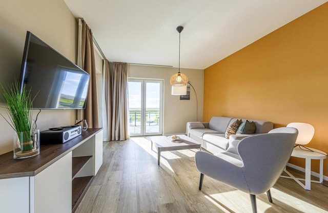5 Sterne Ferienwohnung Boddenstuv mit Balkon und Boddenblick