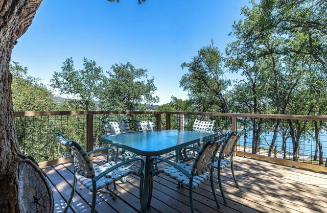 5. Tree House with Game Room (on private peninsula with dock)