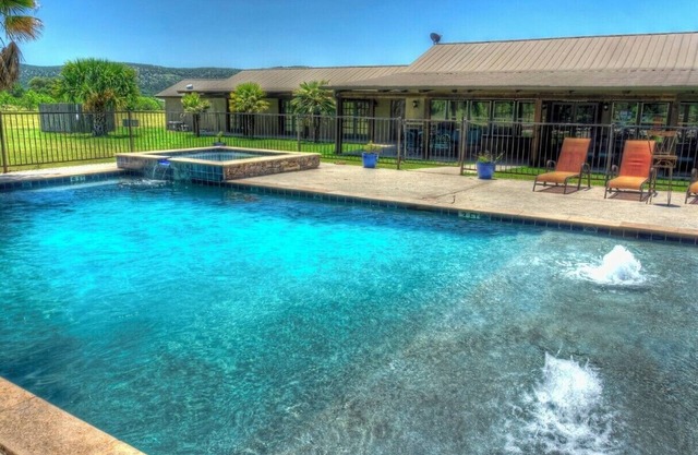 6-bedroom Lodge on 12 acres in Concan, Texas. Swimming pool & hot tub.