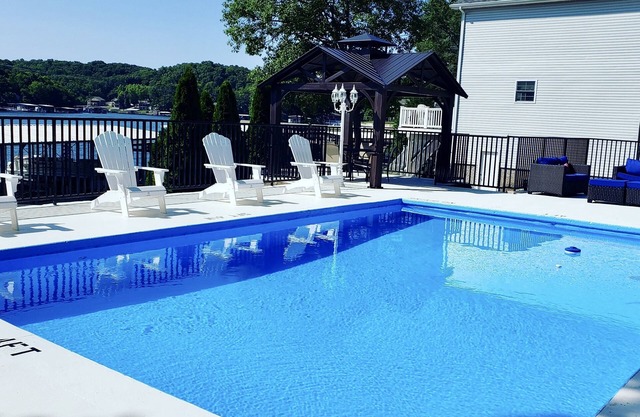 7BR Lakefront Home with Private Heated Saltwater Pool and 2 Dock Slips