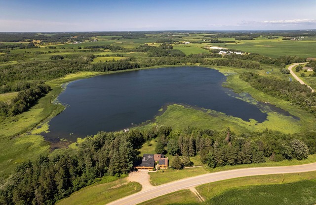 Sleeps up to 22 on a Private Lake, with trails and acreage.