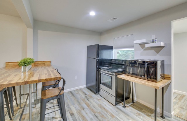 NEW! Bright Cabin w/ Spacious Deck and Fire Pit!