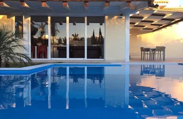 90 qm Wohnung in Villa mit individuellem Pool und Garten