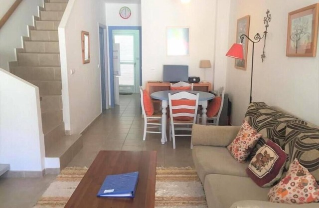 A beautiful 2-bedroom south-facing townhouse five-minutes walk from the beach