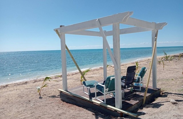 A beautiful apartment on a oceanfront property directly on coral harbour beach.