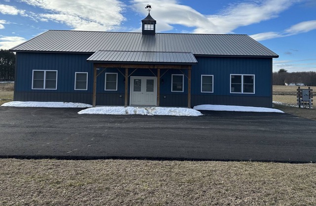 A brand new apartment inside a barn building located on a farm.