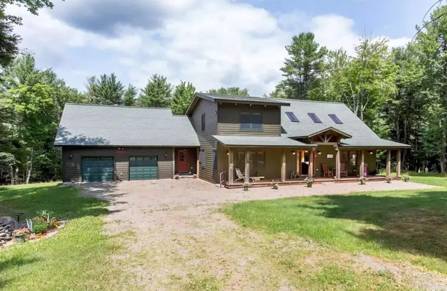 A breathtakingly pristine luxury cabin on 14 private acres