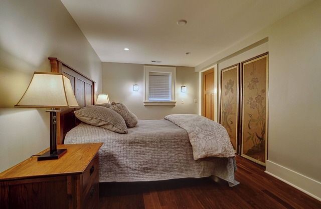 A bright and cozy Bryant apartment: 2-bedroom, dog-friendly, with private yard.