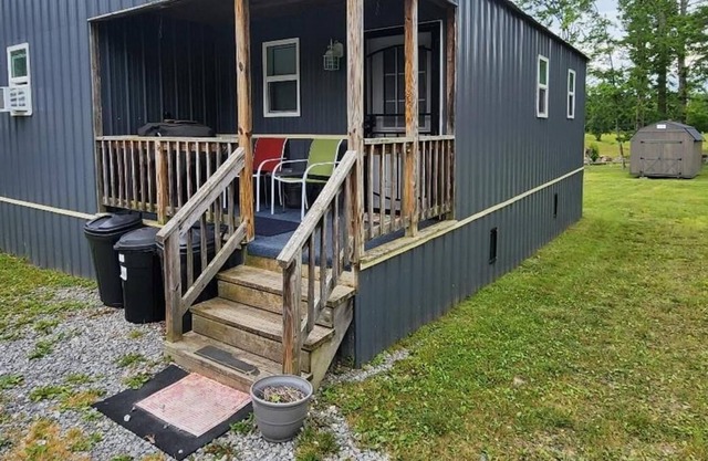 A cabin for the whole family, complete with washer & dryer and a swing set