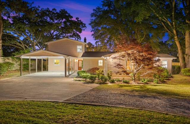 A charming 4-bedroom waterfront with a private dock retreat that offers a secluded serene getaway!
