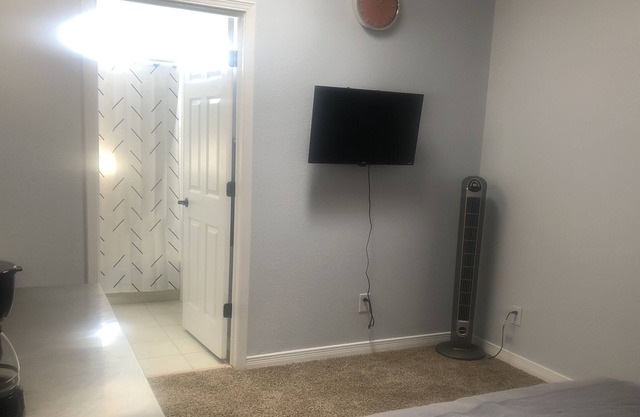 A comfortable studio with a full bathroom