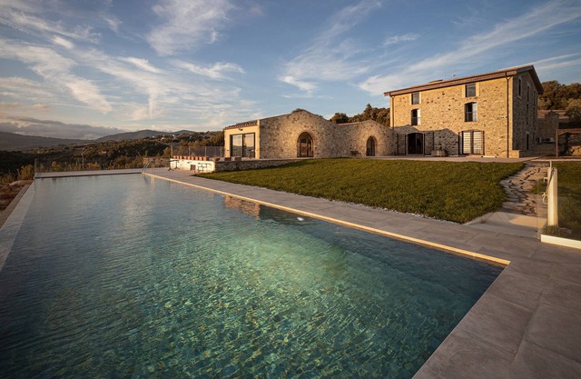 A fantastic pool in a Tuscan farmhouse with breathtaking views of the Maremma