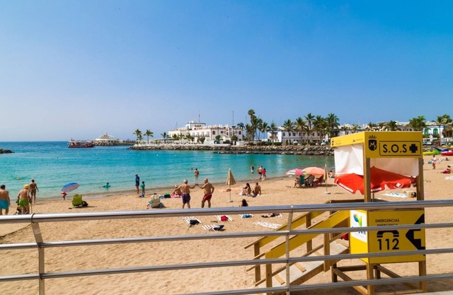A few meters from the beach with a large terrace and mountain views.
