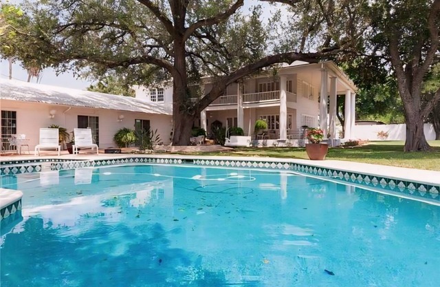 Historic Greek Revival Paradise Estate with Private Pool on 1.5 acres gated
