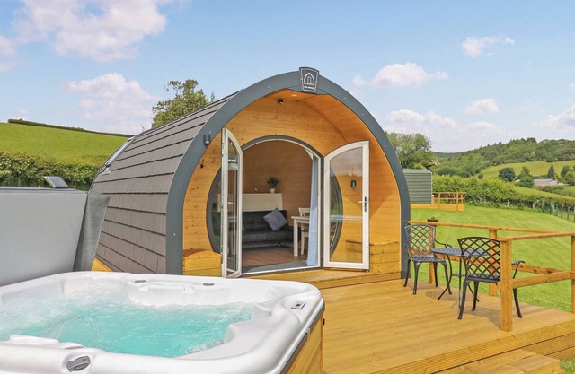 A lovely glamping pod, with a private hot tub, overlooking the rolling hills.