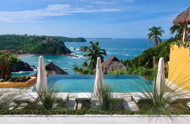 A Mexican oasis of artistry + style with private stairs to beach and boat.