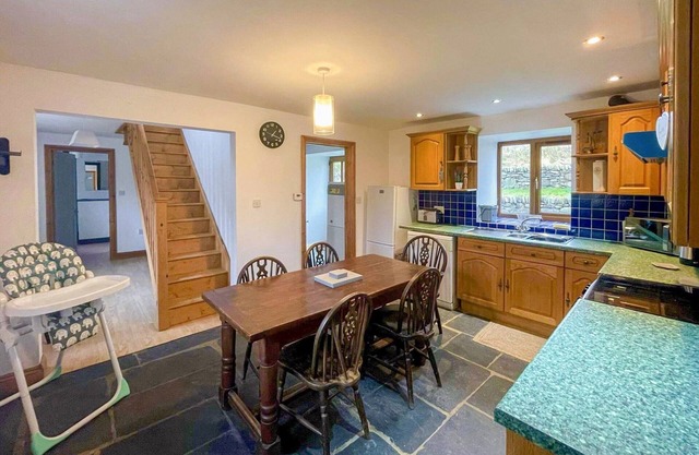 A spacious detached cottage surrounded by stunning scenery with wood fired Hot Tub.