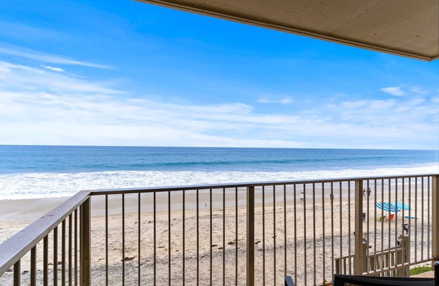 Toes-in-the-sand at A Wave from It All Beachfront Bliss