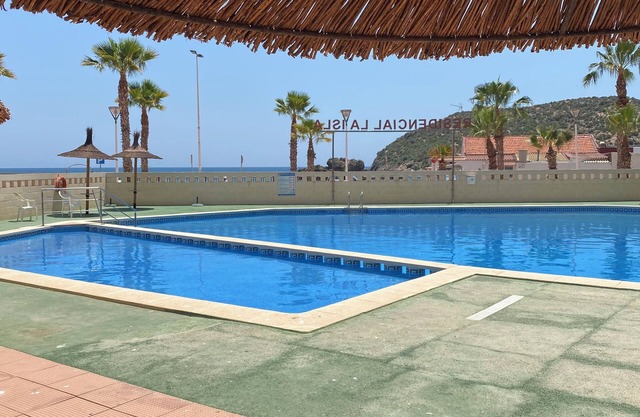 Accessible apartment 50 metres to beach ,large communal pool, sea view balcony