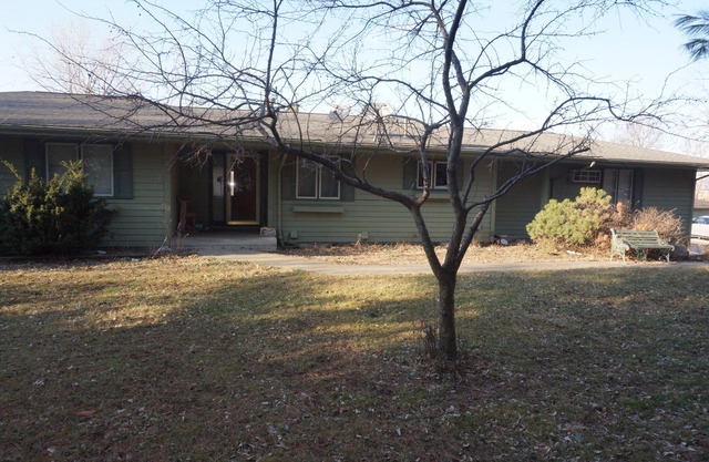 Acreage InTown 4 BR, 2 Bath 3,300 sq ft half house option with gymnasium.