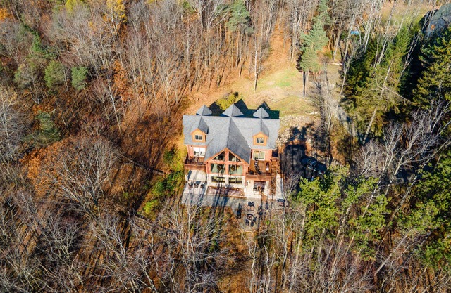 Across from Holimont Ski Resort & 1.5 miles from downtown shopping district.