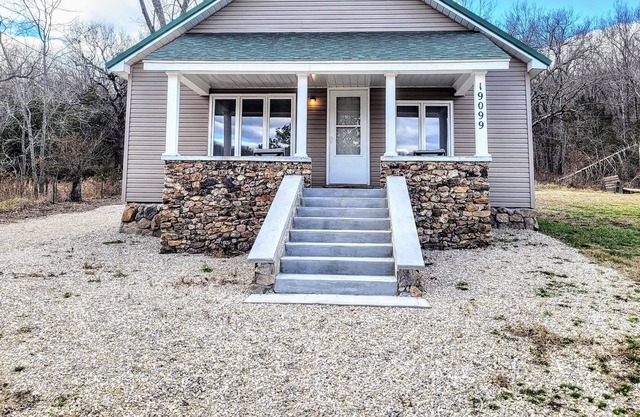 Adorable home with land by the river