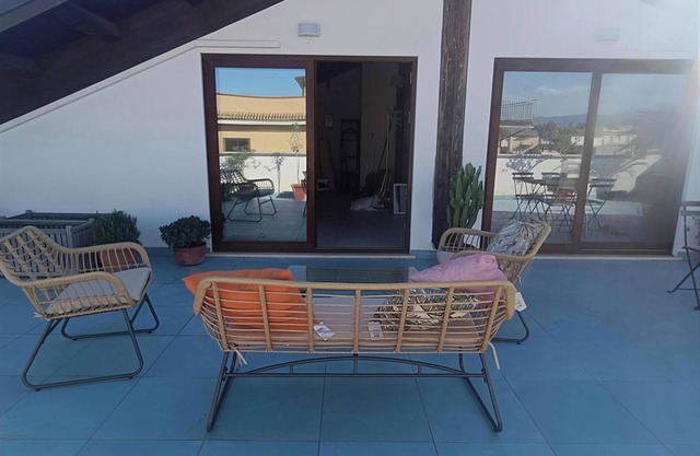 Air-conditioned attic room with large terrace