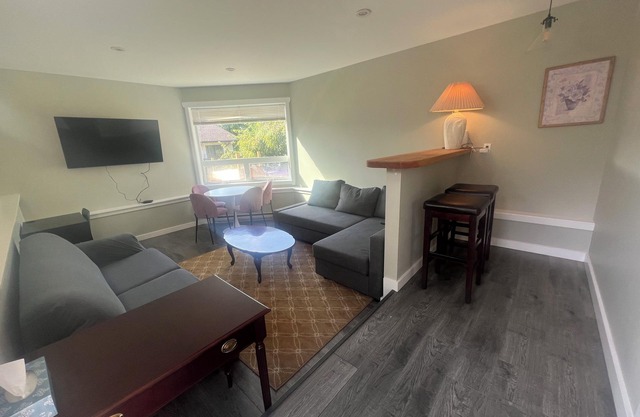 Air conditioned! Queen Suite Sleeps 1-4 guests with Laundry.