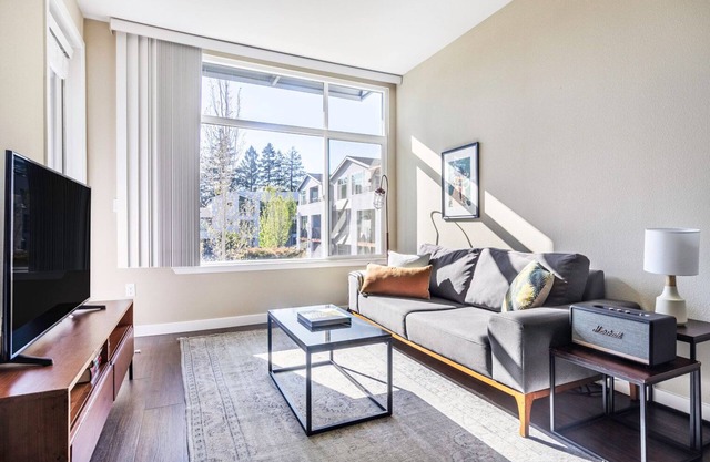 Airy Mountain View 2BR w/ Gym, Pool, BBQ, walk to Caltrain, by Blueground
