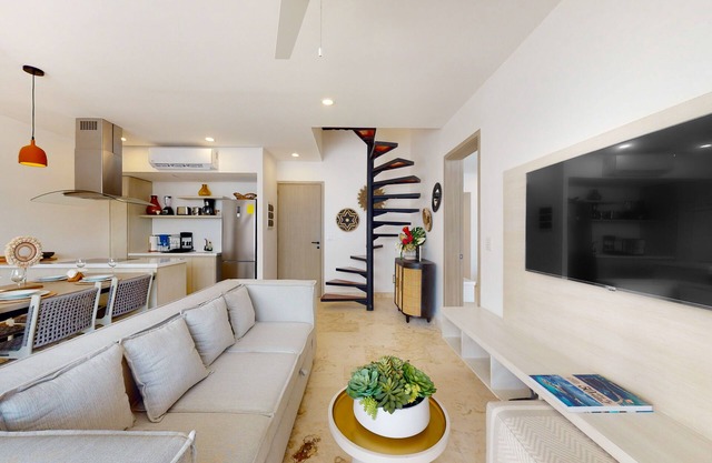 Aldea Zama condo with rooftop pool, private balcony, & great location